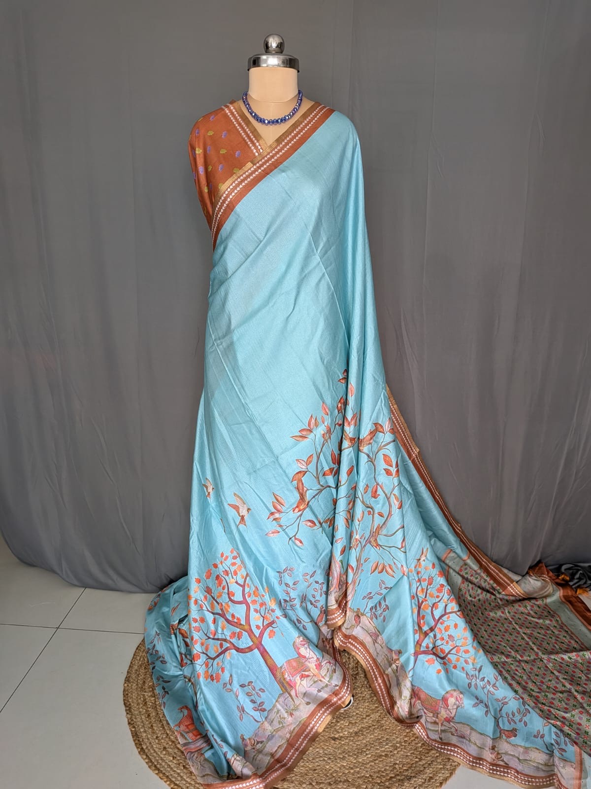 Sky Blue & Rust Orange Printed Saree