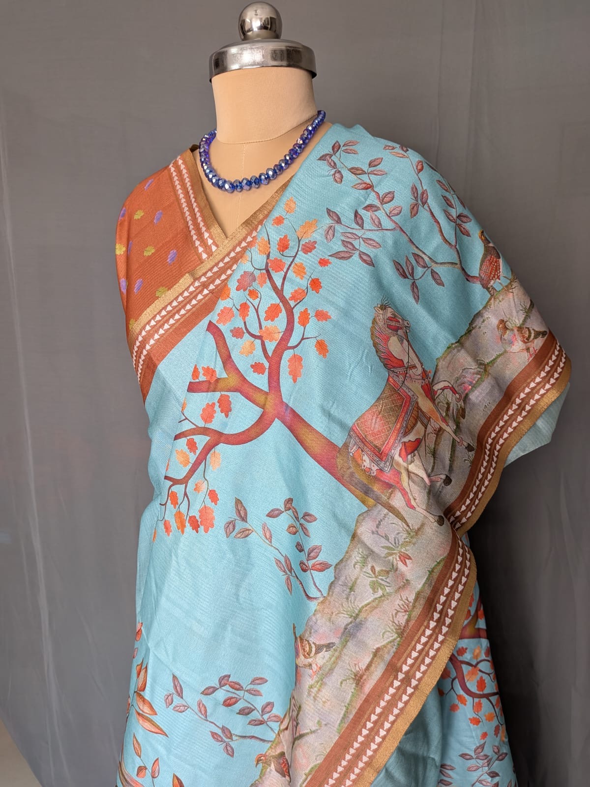 Sky Blue & Rust Orange Printed Saree